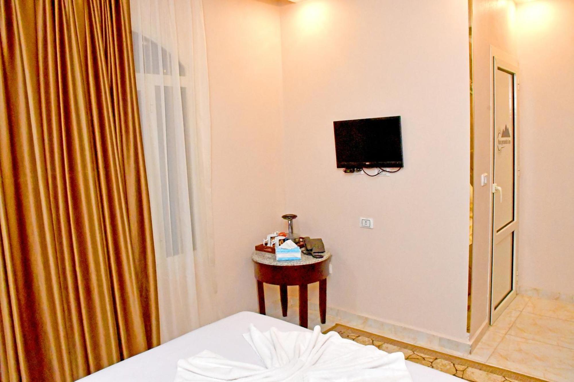 Nun Pyramids Hotel Kafrat al Jabal Phòng bức ảnh