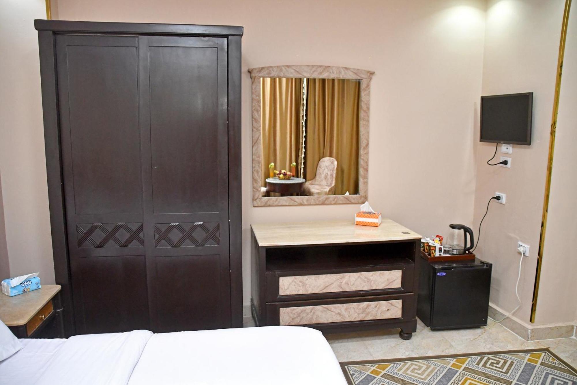 Nun Pyramids Hotel Kafrat al Jabal Phòng bức ảnh